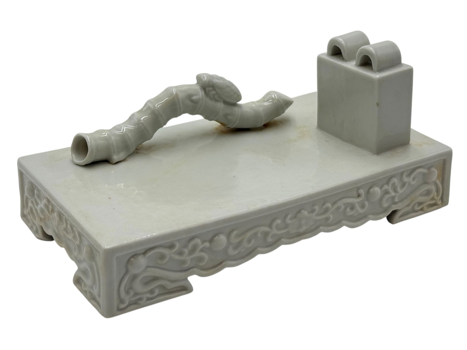 Chinese Blanc de Chine Porcelain Brush Pen stand: Chinese Blanc de Chine Porcelain Brush Pen standChinese Blanc de Chine Porcelain Brush Pen stand – Bamboo & Books Design, Intricately Carved with Seal Mark H: 2 3/4 inches L : 6 3/4 inchesD: 3