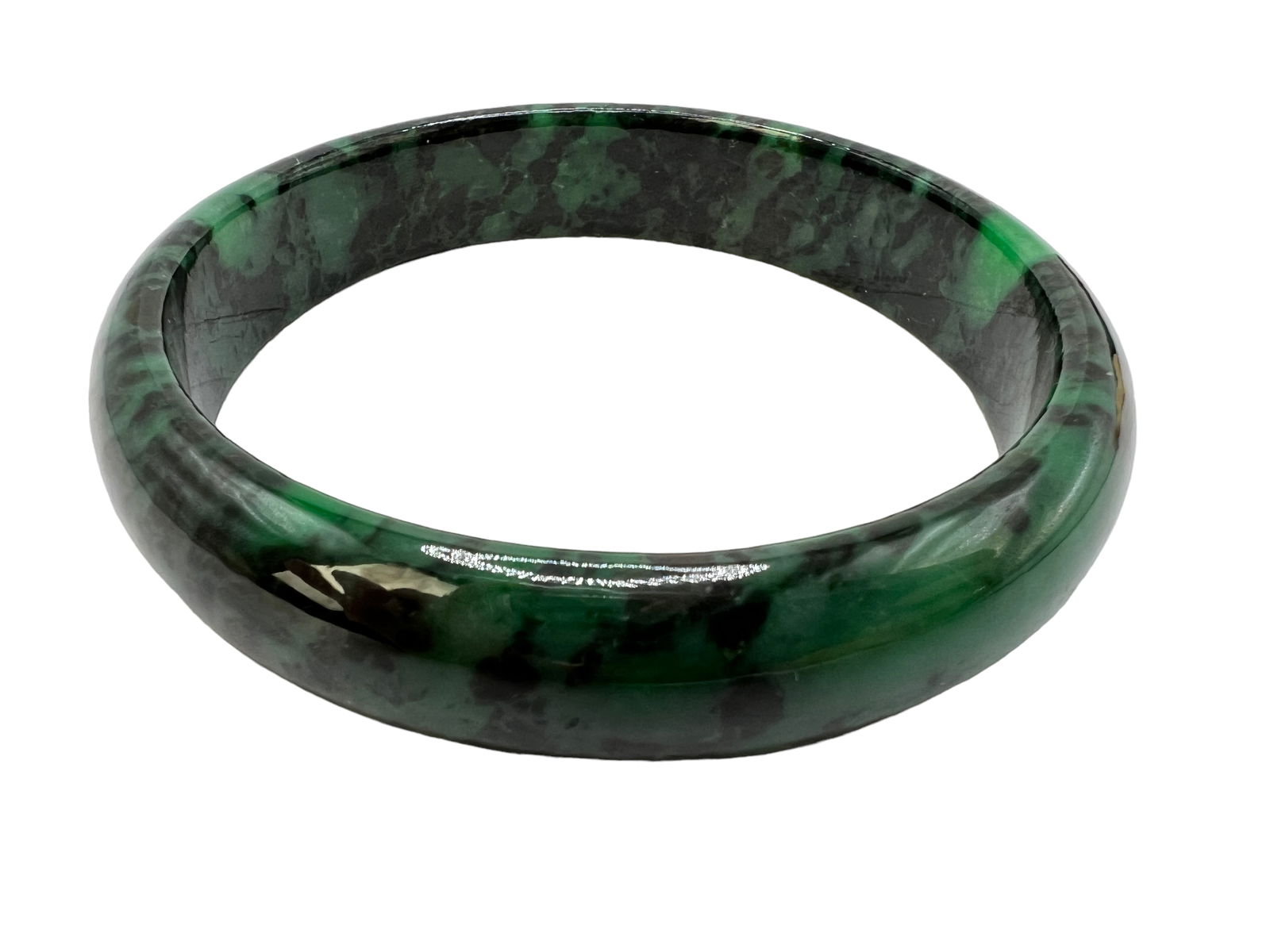 JADE / GREEN STONE BANGLES: JADE / GREEN STONE BANGLESInner diameter approximately 69 mm, width approximately 15.1 mm, thickness approximately 7.3 mm