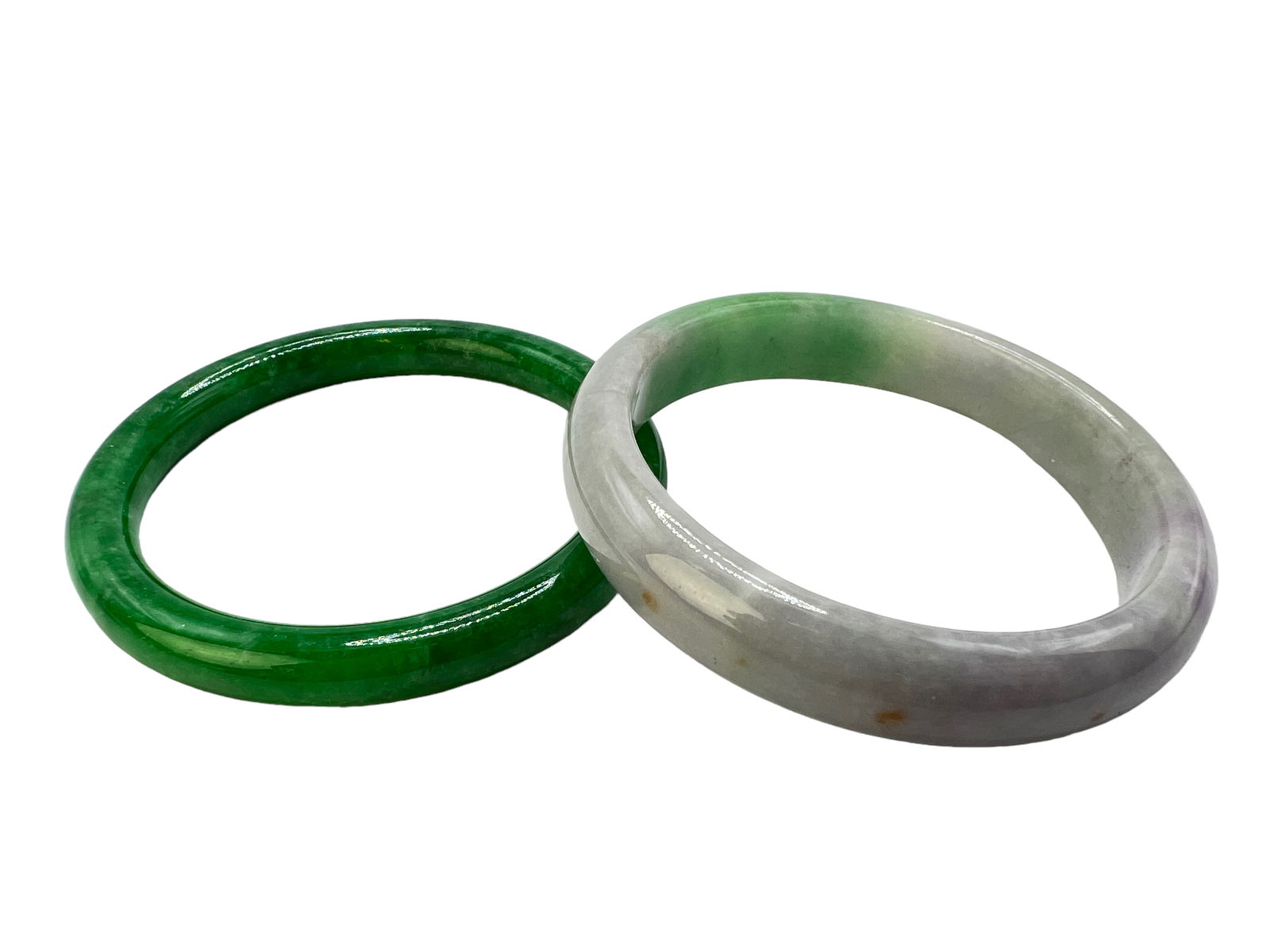 TWO JADE / GREEN STONE BANGLES (1 of 4)