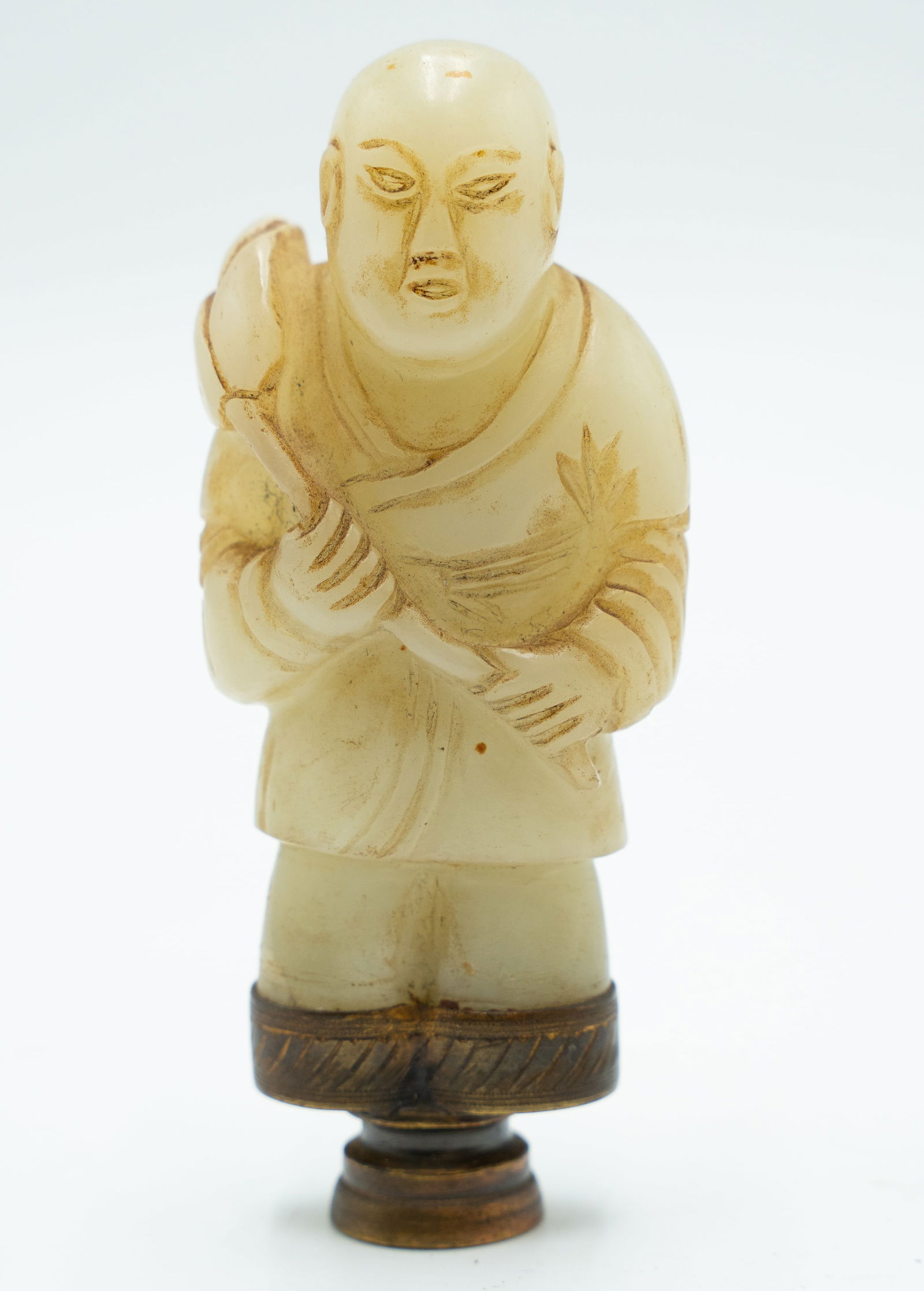 A Chinese White Jade Carved Figure: A Chinese White Jade Carved FigureThe Jade Part: H: 2 3/4 inches W: 1 1/2 inches