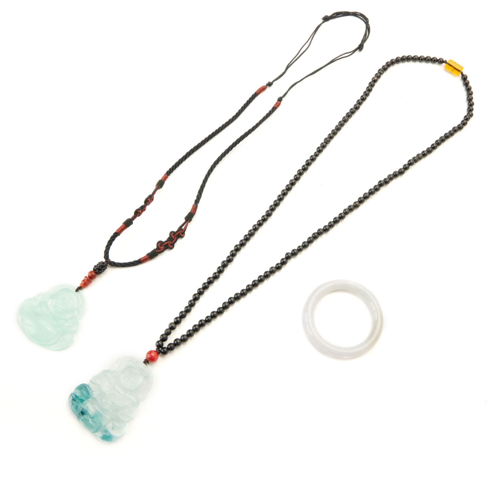 Group of 3 Jadeite Necklace: Group of 3 Jadeite Necklace52g 1.7 inches (4.3 cm) 18g 2 inches (5cm) 21g 2 inches (5cm)