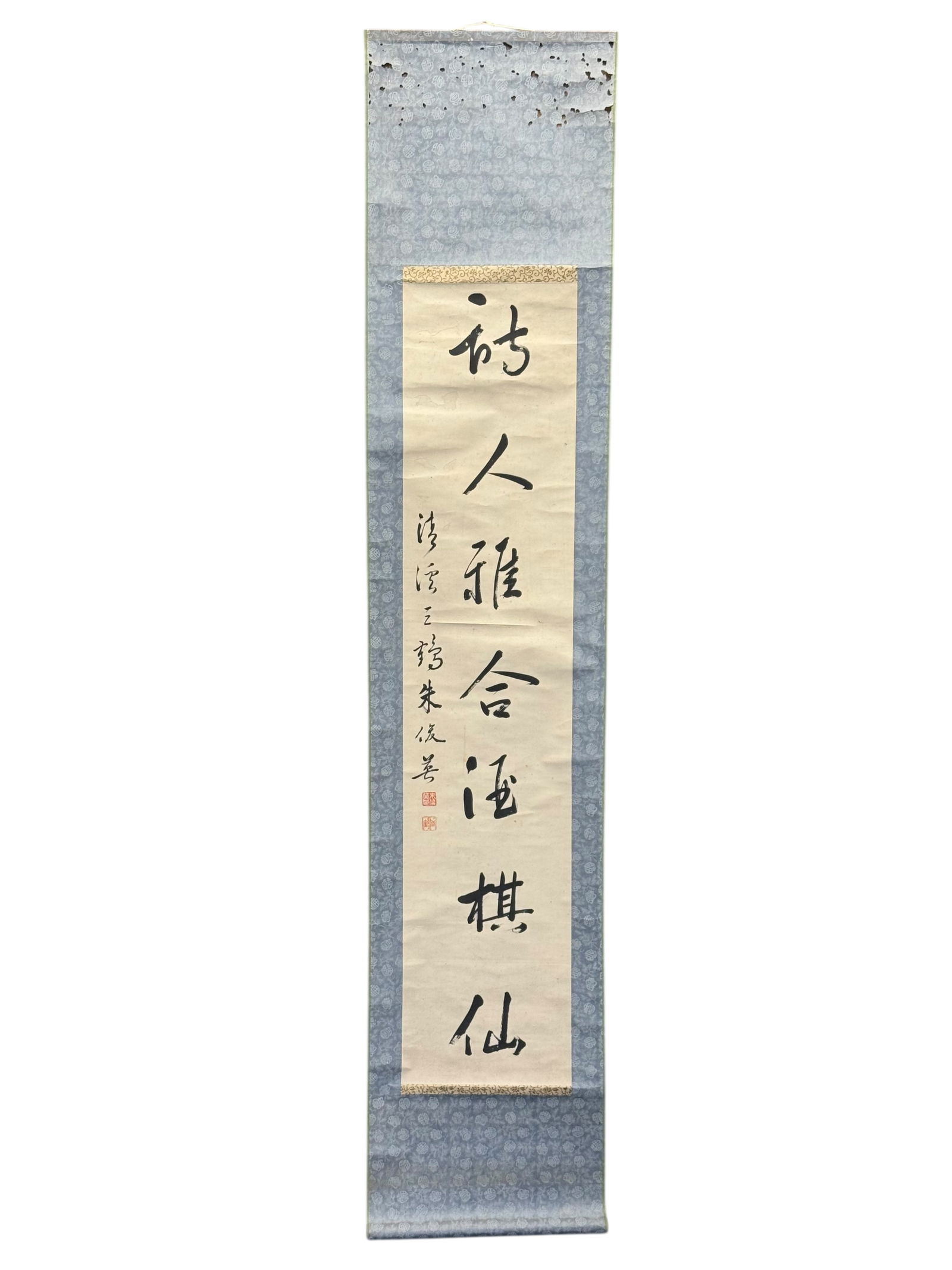 A Chinese Calligraphy Hanging Scroll: A Chinese Calligraphy Hanging ScrollInk on paper, the text rendered in bold calligraphy, with artist seals, mounted as a hanging scroll. Frame:78 inches 16 inches Painting: 54 inches 11 inches