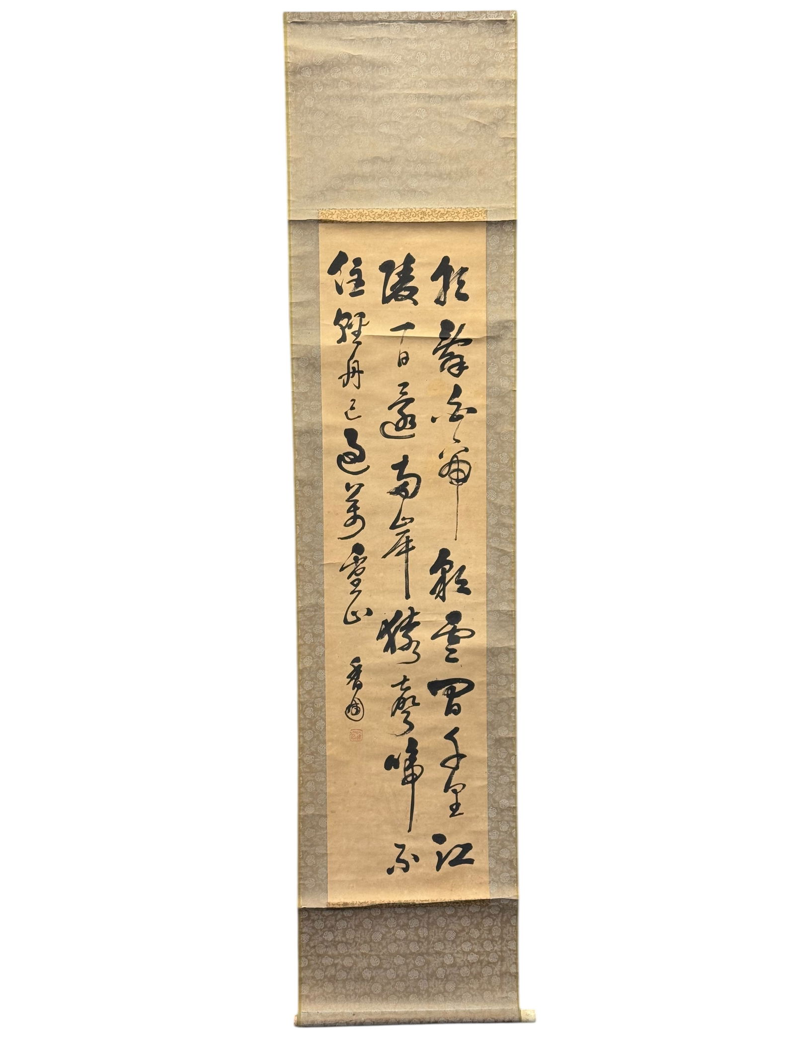 A Chinese Calligraphy Hanging Scroll: A Chinese Calligraphy Hanging Scrollnk on paper, the text executed in running script calligraphy, mounted as a hanging scroll. Frame: 75 inches 17 1/2 inches The Painting 53 inches 12 inches