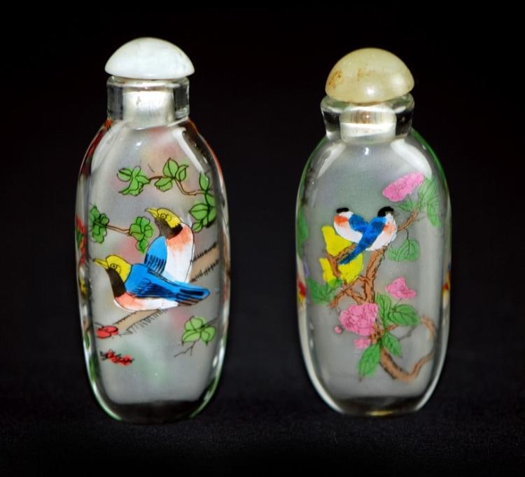 PAIR OF INTERNALY PAINTED SNUFF BOTTLES: PAIR OF INTERNALY PAINTED SNUFF BOTTLESA pair of snuff bottles painted with bird and flower patterns on the body. H:2 3/4in(7cm)
