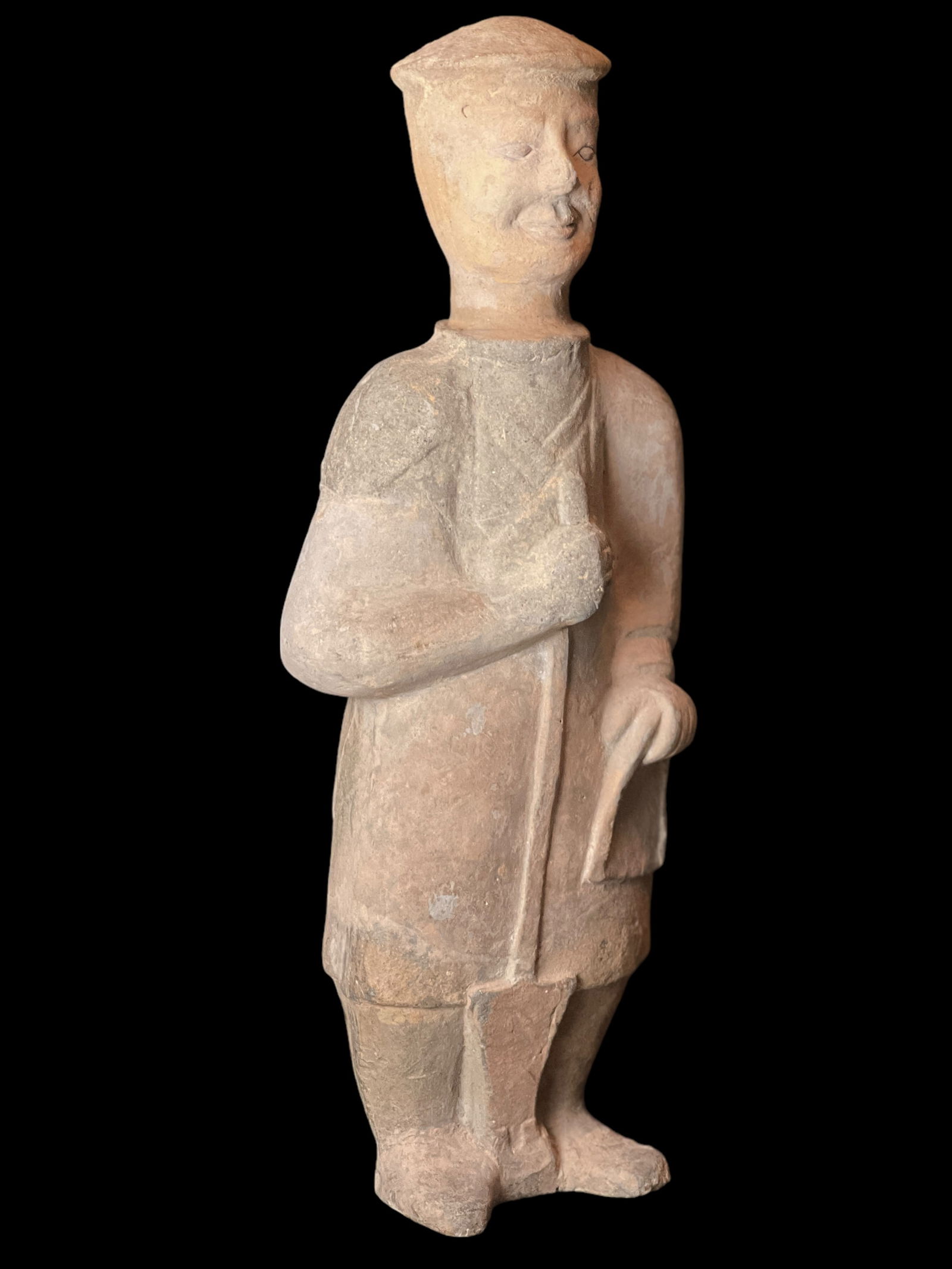 A pottery figure of a farmer, Man: A pottery figure of a farmer, ManH : 17 1/2 in ( 44.45 cm ) W : 6 3/4 in ( 17.15 cm ) L : 3 3/4 in ( 9.53 cm )