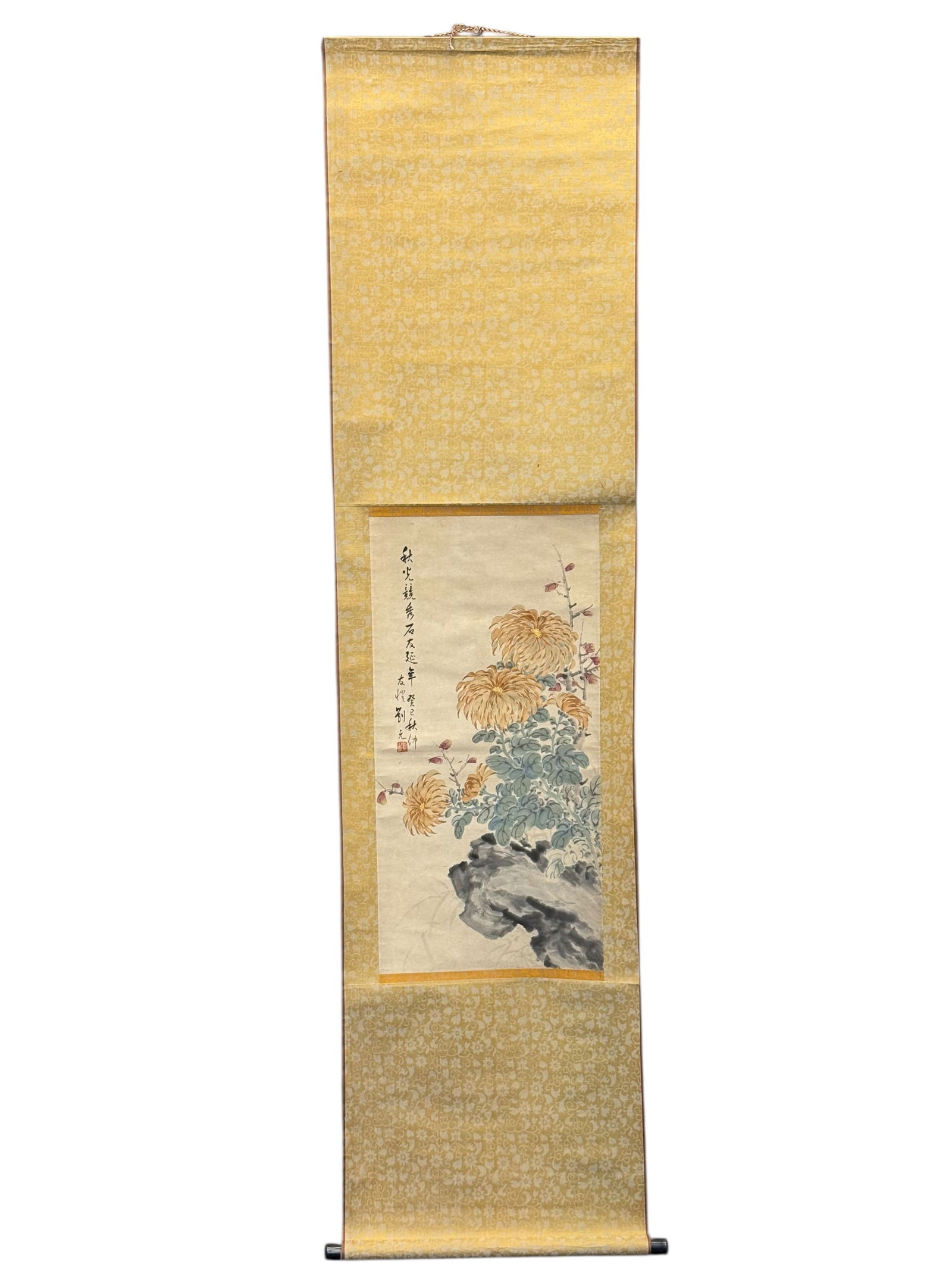 A Chinese Chrysanthemum Painting Hanging Scroll: A Chinese Chrysanthemum Painting Hanging ScrollInk and color on paper depicting chrysanthemums beside rockwork, with inscription and seals, mounted as a hanging scroll. Frame: 71 inches 