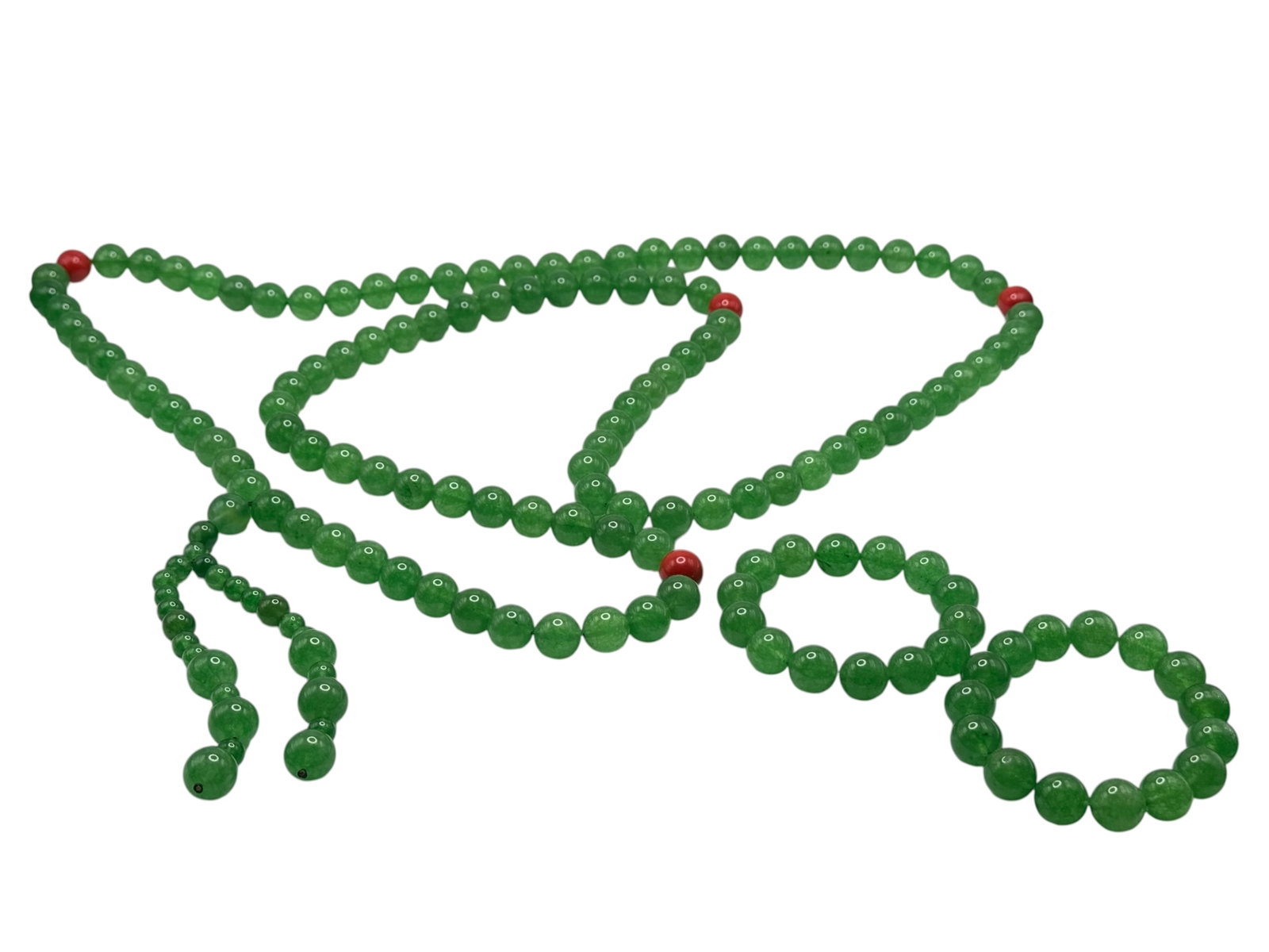 A Chinese green stone Bead Necklace: L: 33 inches Weight: 585 grams