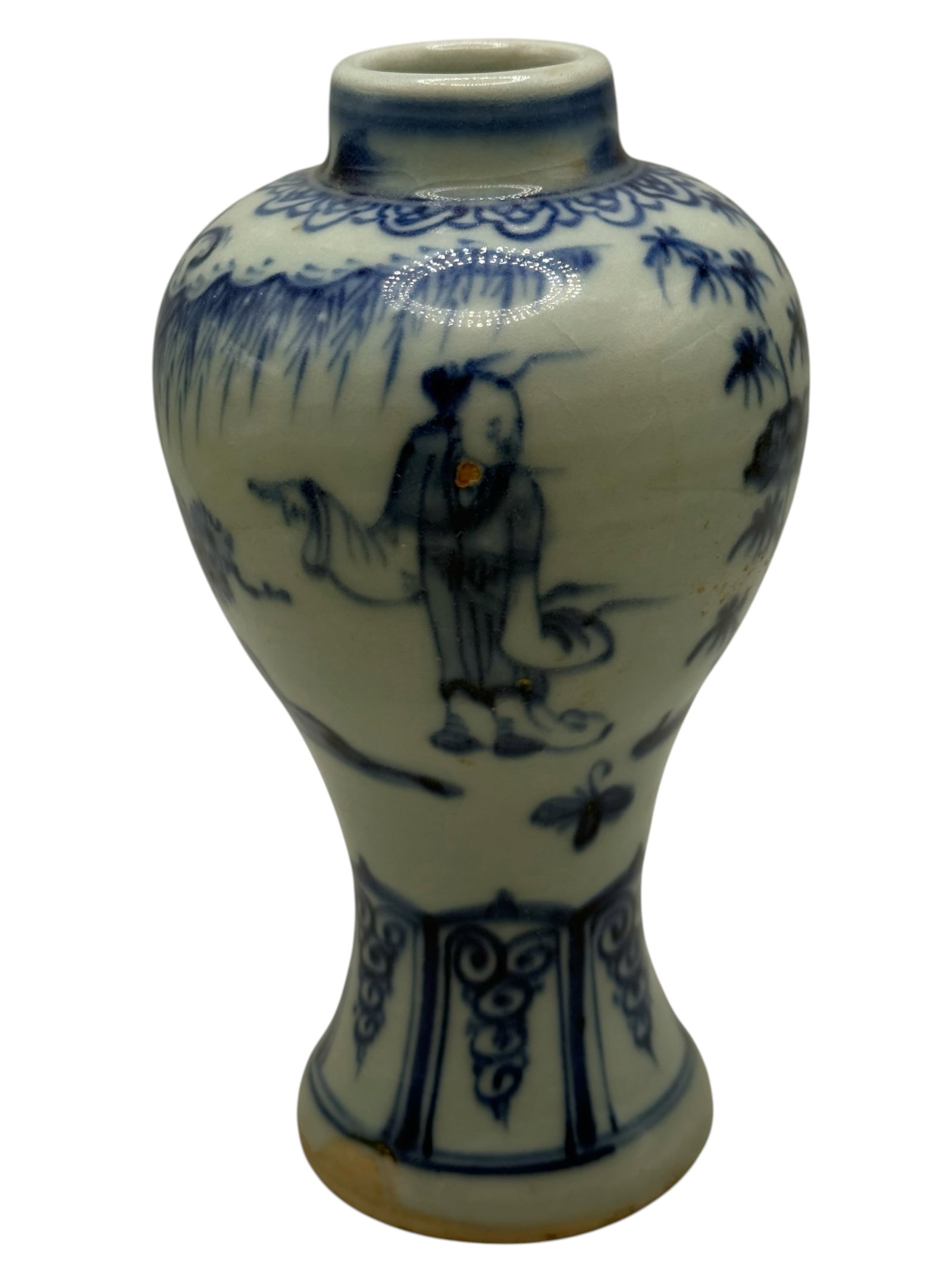 A Chinese Blue and White Porcelain Vase: Painted with figures in a landscape beneath a floral border, the foot with geometric decoration. H: 6 inches W: 3 1/2 inches