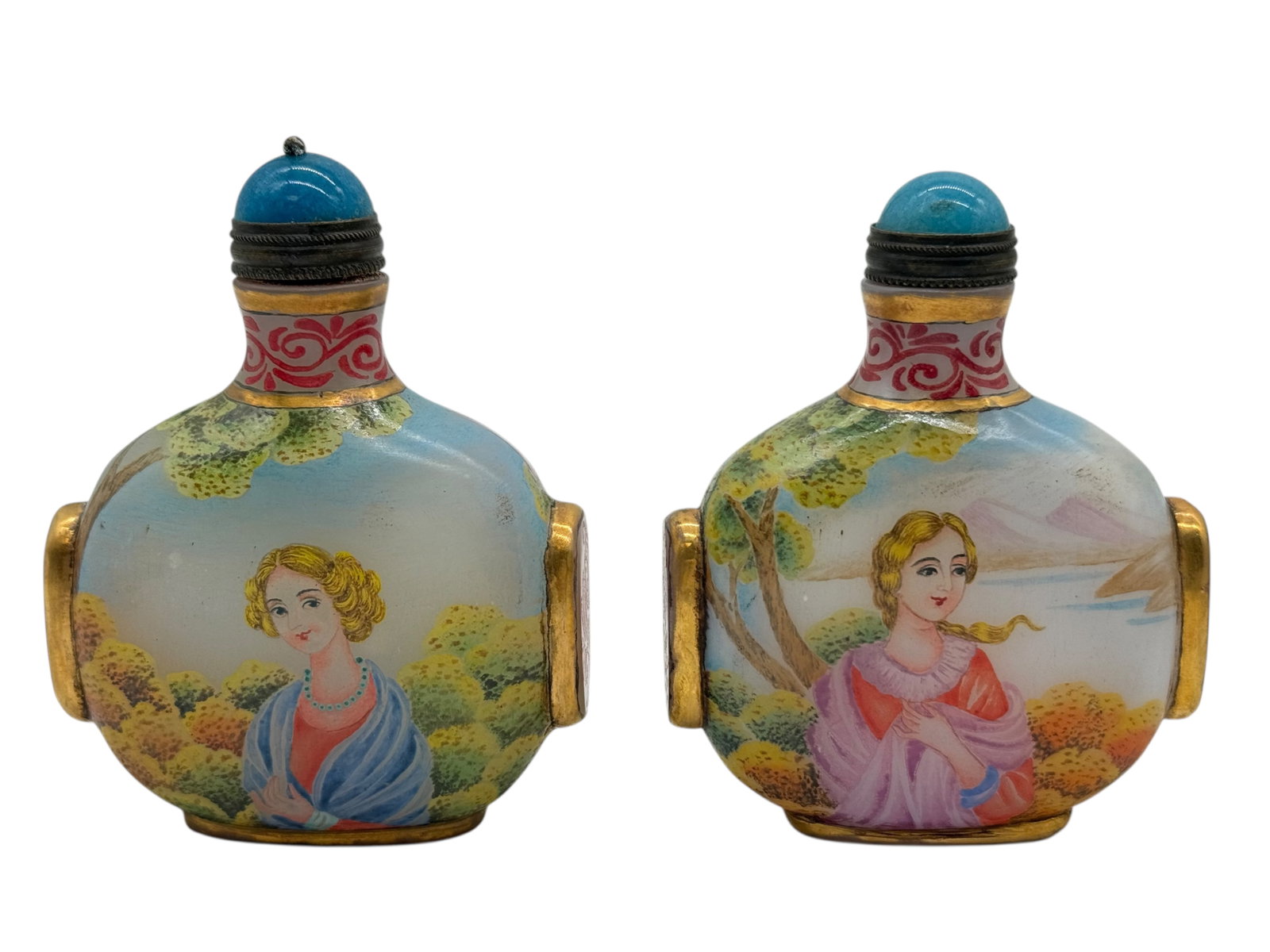 Two Chinese Glass Snuff Bottle with European Fig: Each of flattened oval form, painted in polychrome enamels with European female figures in landscape settings, the shoulders applied with gilt-scroll panels, the necks encircled by red scroll bands;