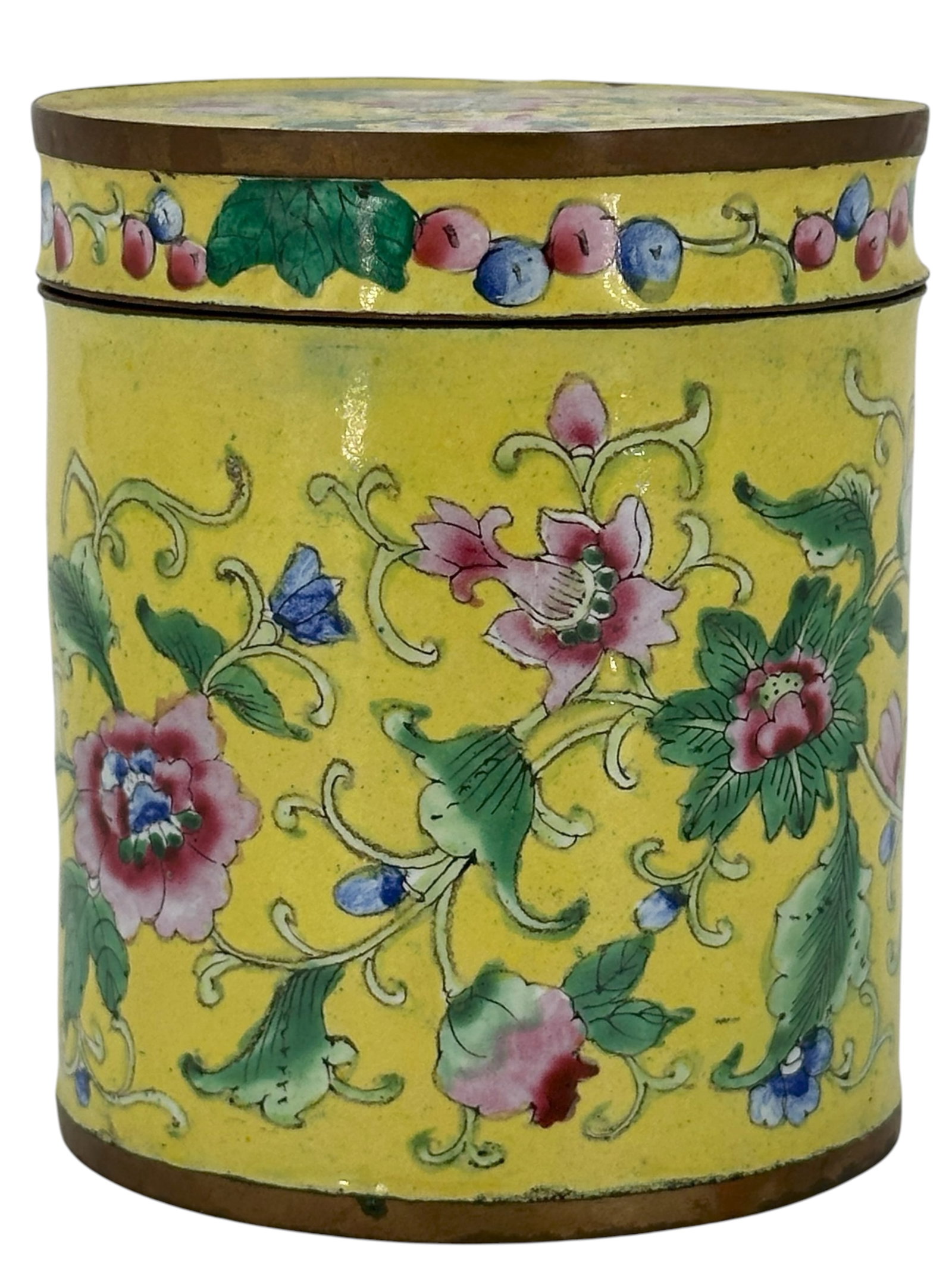 A Chinese Yellow-Ground Enameled Covered Box: Of cylindrical form, decorated with scrolling floral motifs and a fruiting vine border. Size: 3 7/8" * 3 1/4"