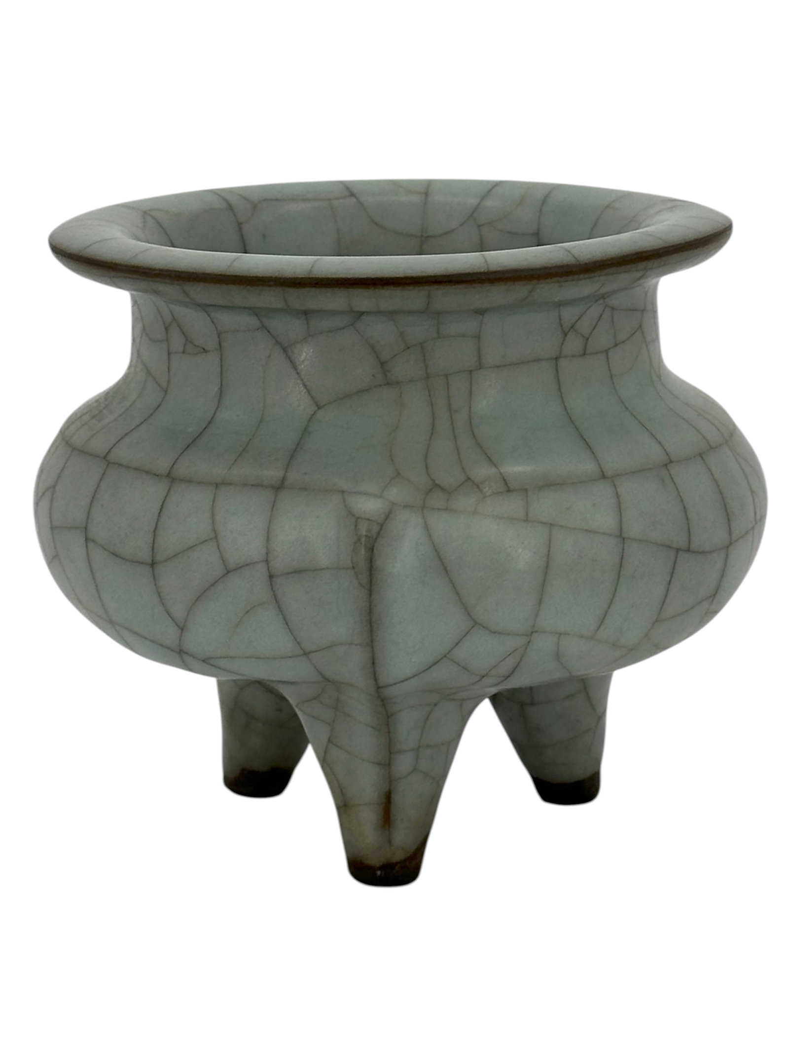 A Chinese Crackle-Glazed Tripod Censer: Of compressed circular form raised on three short feet, covered in a pale crackle glaze. Size: 4" * 4 5/8"