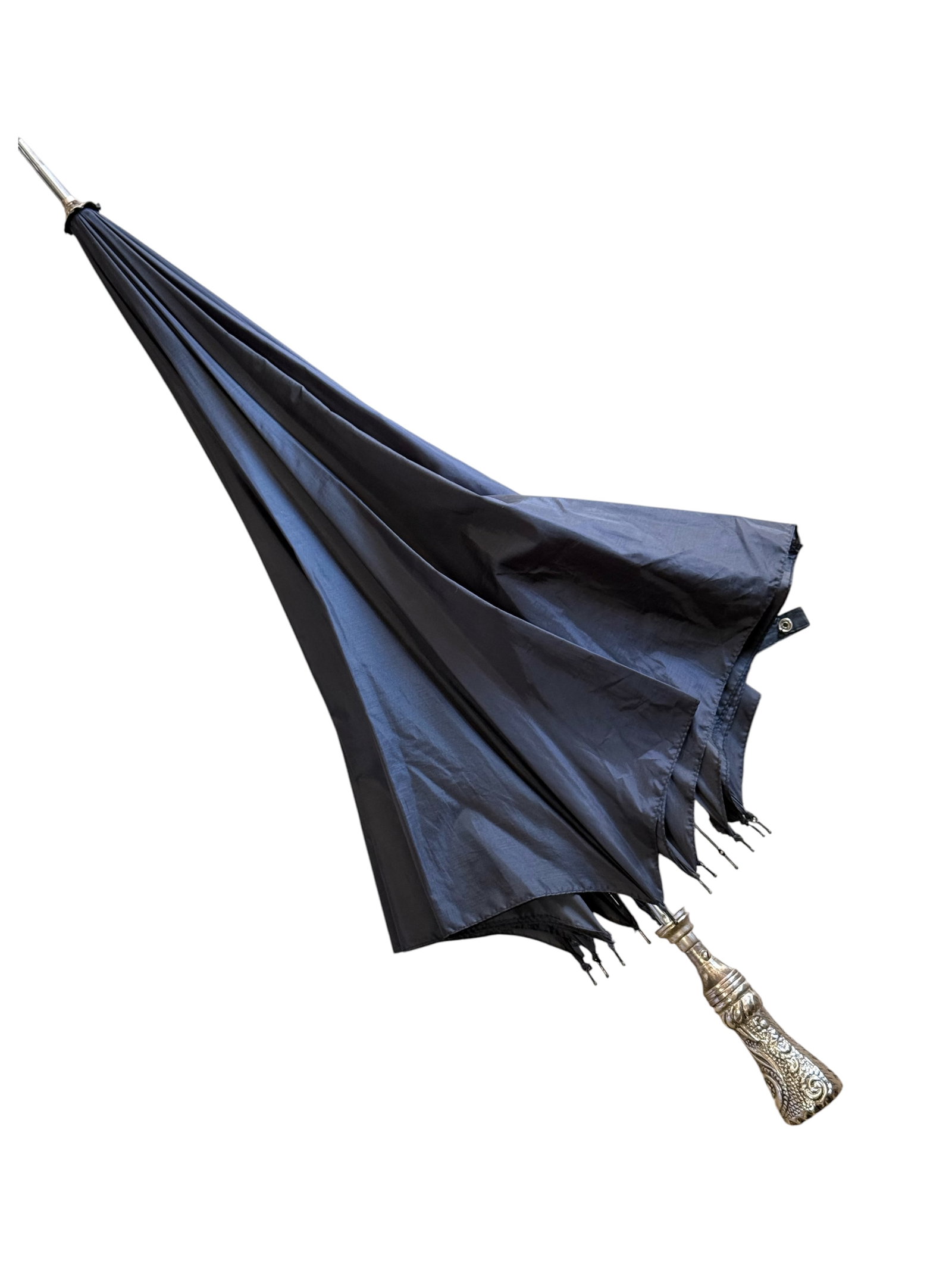Victorian metal silver Umbrella: With an embossed silverplate handle decorated in scrolling foliage. L: 52 1/2 inches