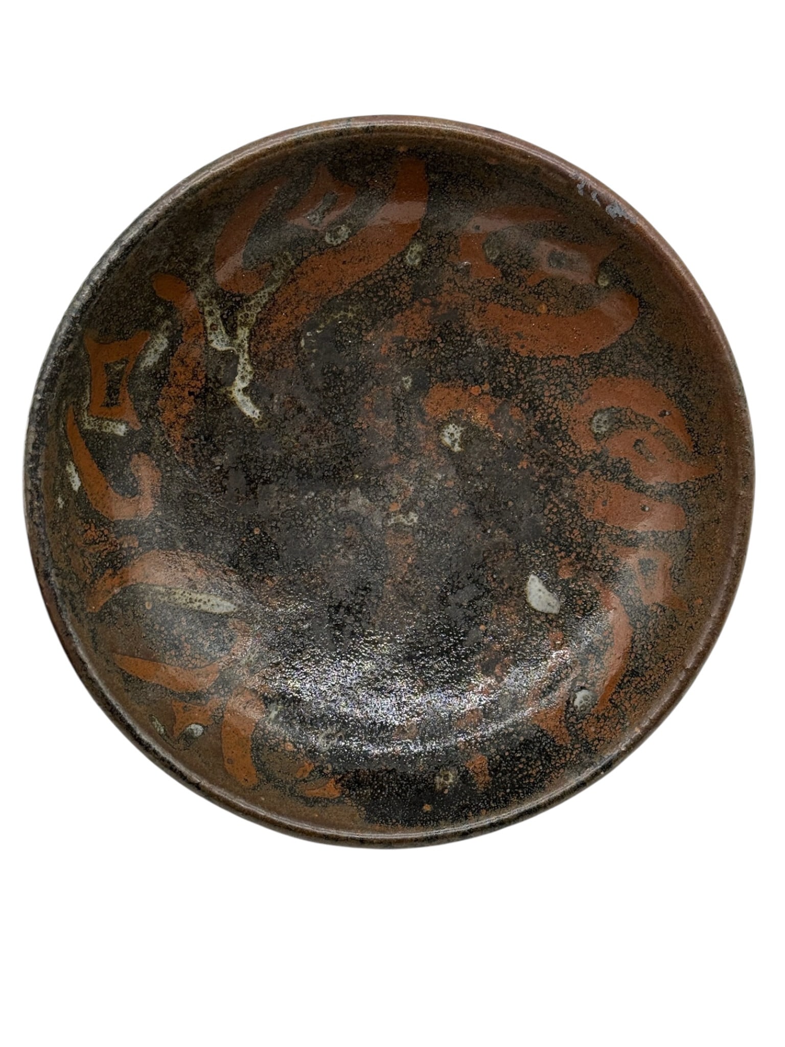 A RUSSET-SPLASHED BLACK-GLAZED BOWL: H: 1 3/4 inches D: 7 1/2 inches