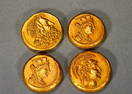 Four ancient Greek portrait coins