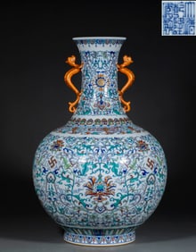 Qianlong year of Qing Dynasty powder enamel flower pattern dragon ear statue