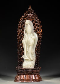 Hetian jade holding lotus Guanyin