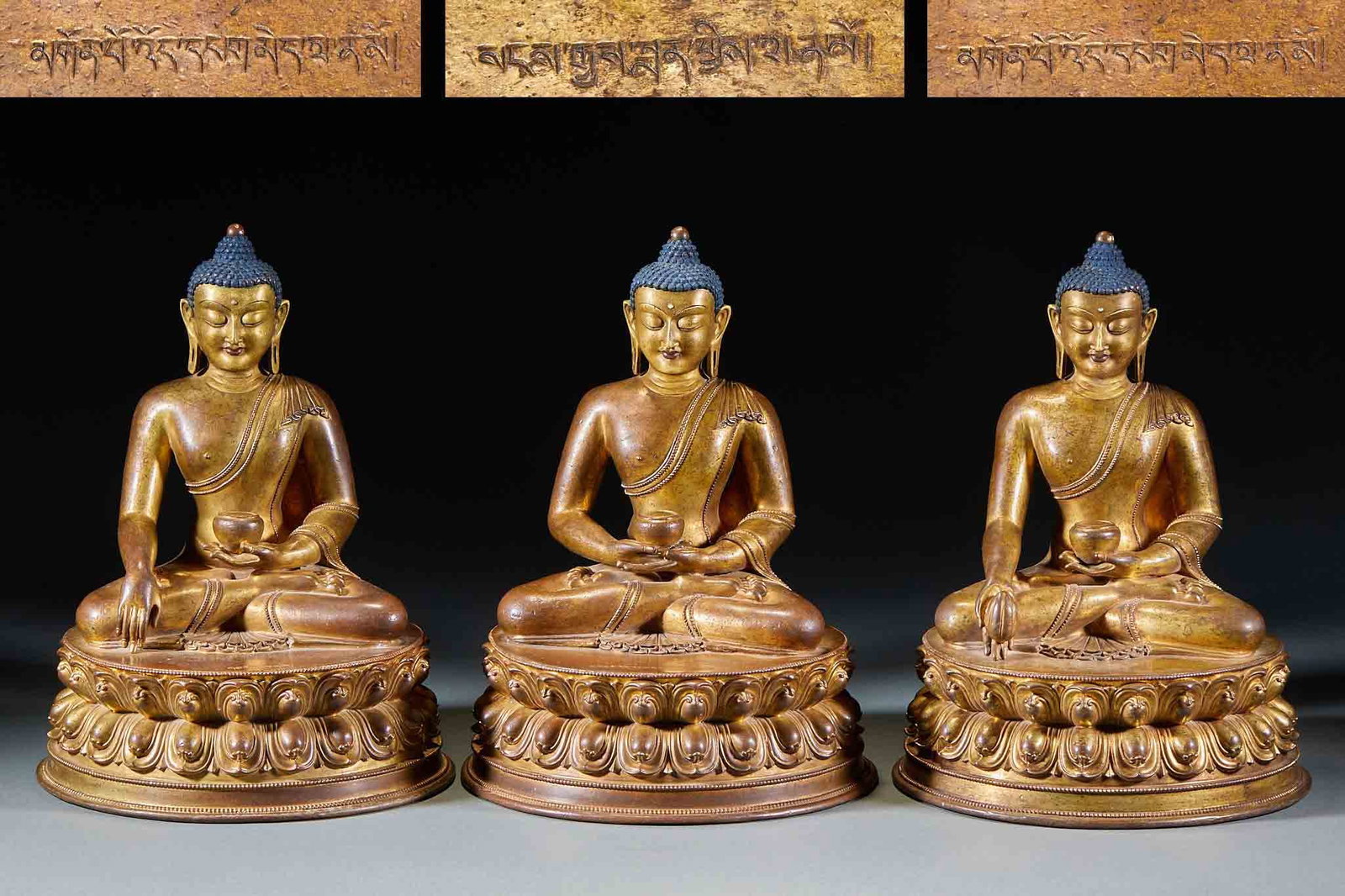 A set of bronze and gold-plated Buddha statues.: A set of bronze and gold-plated Buddha statues.Individual height 26cm and diameter 20cm