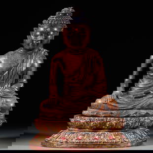 Incense Wood Buddha Sakyamuni Seated Statue: The Buddha statue of Sakyamuni made of agarwood: The material is the precious agarwood, and it is crafted with the round carving technique, depicting the solemn and dignified image of Sakyamuni in the