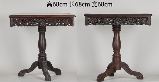 A pair of wooden coffee tables