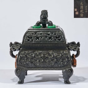 A sandalwood incense burner with dragon-shaped handles from the Qianlong period of the Qing Dynasty