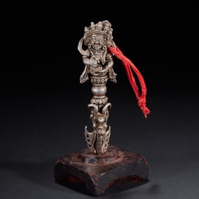 A silver-inlaid Vaisravana with a vajra from the Ming Dynasty or before