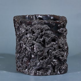 A rosewood pen holder with pine and crane patterns