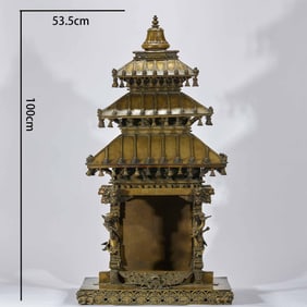 A bronze Buddha niche