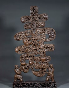 A sandalwood "Wan Shou Wu Jiang" figurine