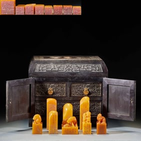 A set of eight Qianlong imperial seals with animal patterns in Longquan stone