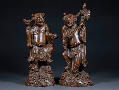 Qing Dynasty "Chenxiang" and "Hehe" Immortals: A pair of sandalwood "Hehe Erxian" (Two Immortals of Harmony) from the Qing Dynasty, 34 cm high, 14 cm long and 11 cm wide.