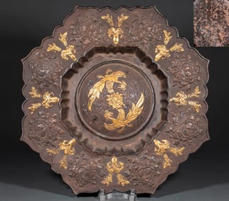 A gilded and engraved petal basin with two phoenixes presenting auspiciousness from the Liao and Jin