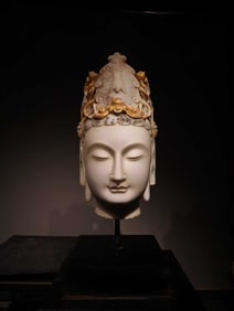 The head of the Bodhisattva with a cicada crown painted in white marble from the Northern Qi Dynasty