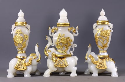 A set of Hetian white jade gilded elephant vases, symbolizing "Peace with elephants"