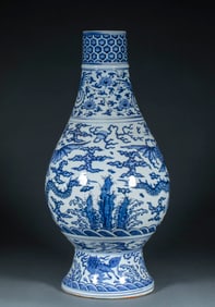 A Ming Dynasty blue and white porcelain vase with auspicious dragons and phoenixes