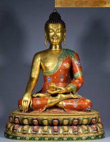 A cloisonne enamel seated statue of the Medicine Buddha made during the Qianlong period