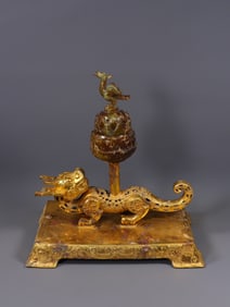 A copper gilded beast furnace with red spots and green rust inlaid with Hetian jade belts from the