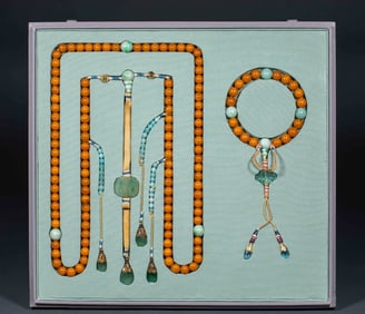 Beeswax jadeite paired with court beads