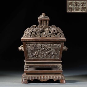 A dragon-patterned incense burner was made and inscribed by Emperor Qianlong of the Qing Dynasty