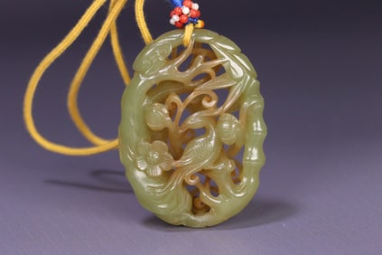 A Qing Dynasty Hetian yellow jade hollowed-out "Happy on the Brow" plaque