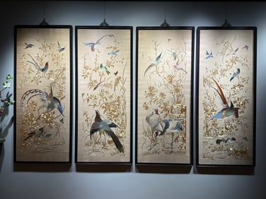 A set of gilded and embroidered birds