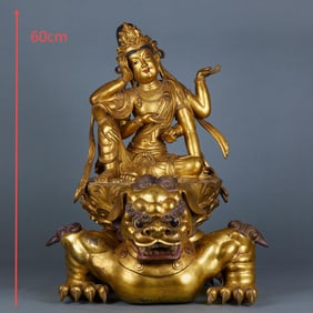 Gilded copper six-armed free-spirited Guanyin