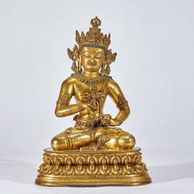 Gilded Ming Dynasty copper with inlaid turquoise vajra sachets