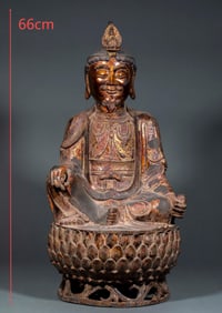 A bronze male statue of Guanyin