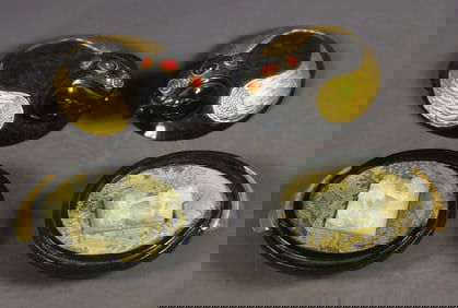 A pair of Hetian jade and gold-inlaid dragon-shaped seals with inscriptions
