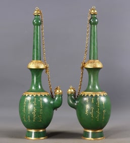 A pair of gold-inlaid Hetian jade water bottles with inscriptions
