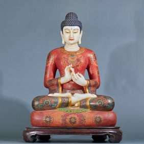 Colored Han white jade seated Buddha statue
