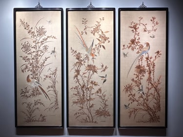 An embroidered Qing Dynasty textile featuring a gold-plated bird motif, crafted in Guangdong style