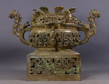 A hollowed-out square bronze vessel from the Warring States or Han period
