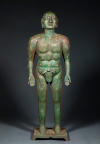 A gold-inlaid and silver-inlaid figure of a person for acupuncture before the Ming Dynasty