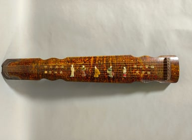 A lacquer-coated wooden screen with inlaid figures, inscribed poems and a guqin (Chinese zither)